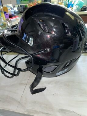 Schutt youth softball helmet with face mask and chin strap